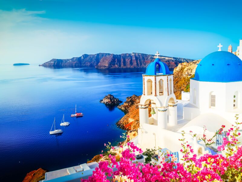 White,Church,Belfry,And,Volcano,Caldera,With,Sea,Landscape,,Beautiful