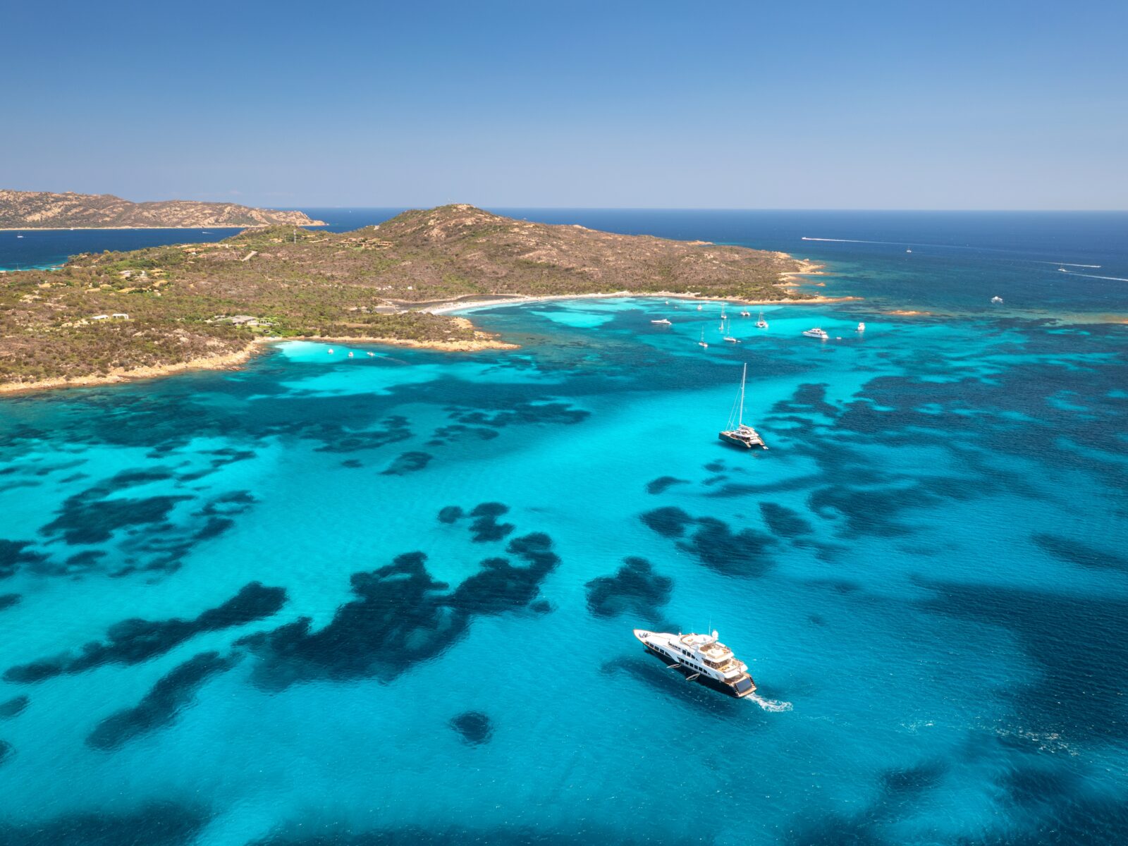 Aerial,View,Of,Luxury,Yachts,And,Boats,On,Blue,Sea,