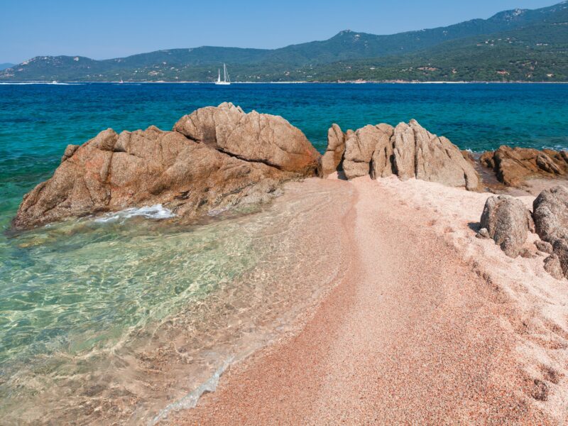 Beach,Landscape,With,Waves,And,Coastal,Rocks,On,A,Sunny